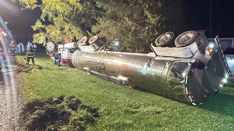 Tractor-trailer spills diesel, milk after rollover crash