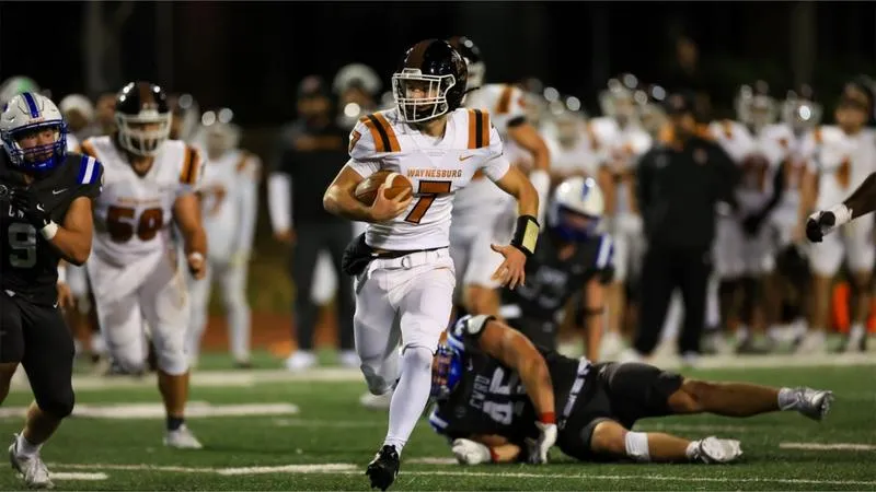 Football plays under the lights at Case Western Reserve