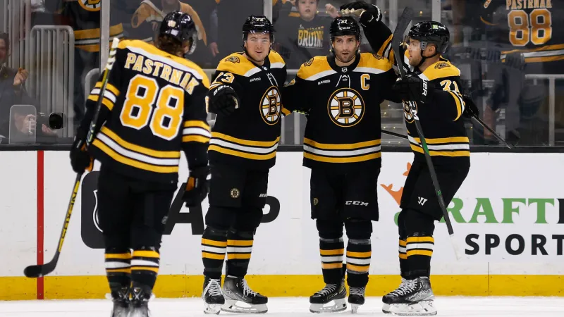 Bruins improve to team-record 9-0 at home, beat Canucks