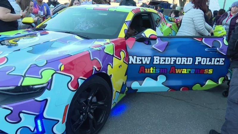 Snazzy New Bedford police car promotes Autism Awareness