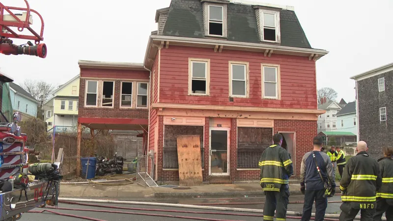 Firefighters battle flames at New Bedford home