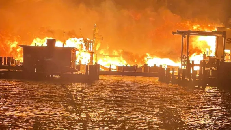 Investigators search for cause of 'wind driven' fire that broke out at Mystic marina