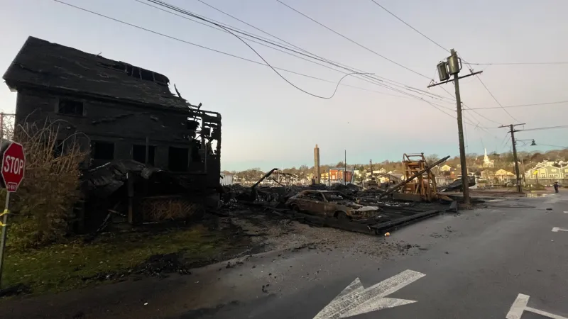 Cause of fire at Mystic marina still under investigation as cleanup continues