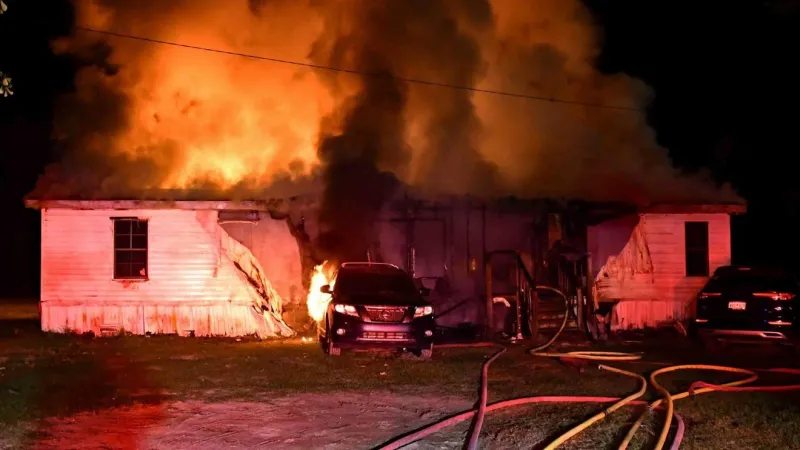 1 dead and another critically burned after re-entering house fire to save animals