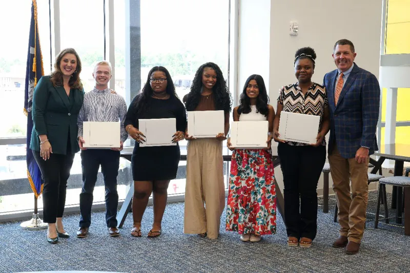 Five student essay contest writers honored