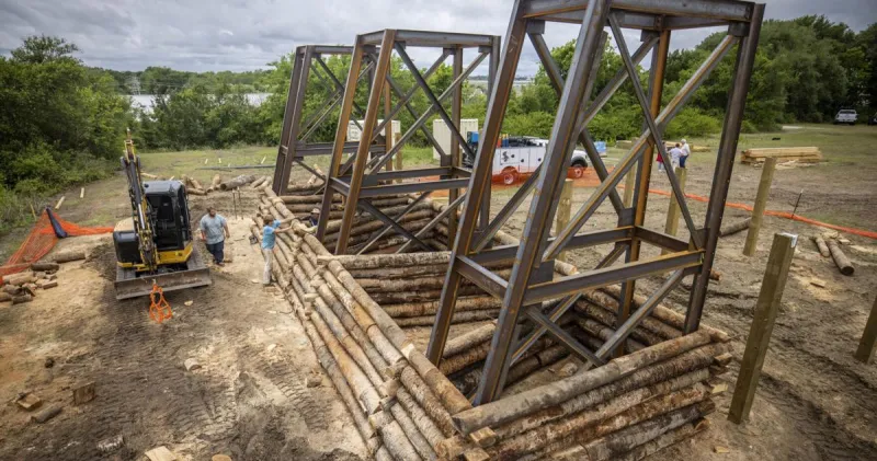 Construction underway for replica Palmetto log fort. Will it be ready in time for Carolina Day?