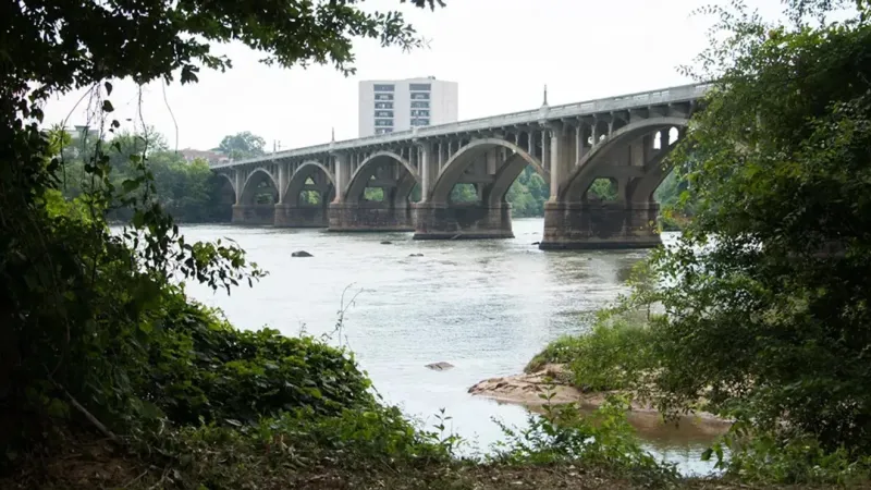 Pedestrian thrown off bridge in crash dies