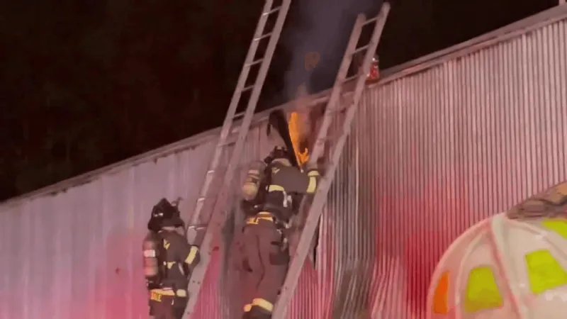 Firefighters battle blaze at vacant business