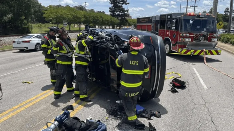 Lexington firefighters extricate driver after SUV overturns