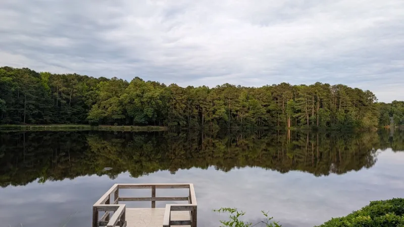 Cloudy skies, light rain showers, and much cooler temperatures today