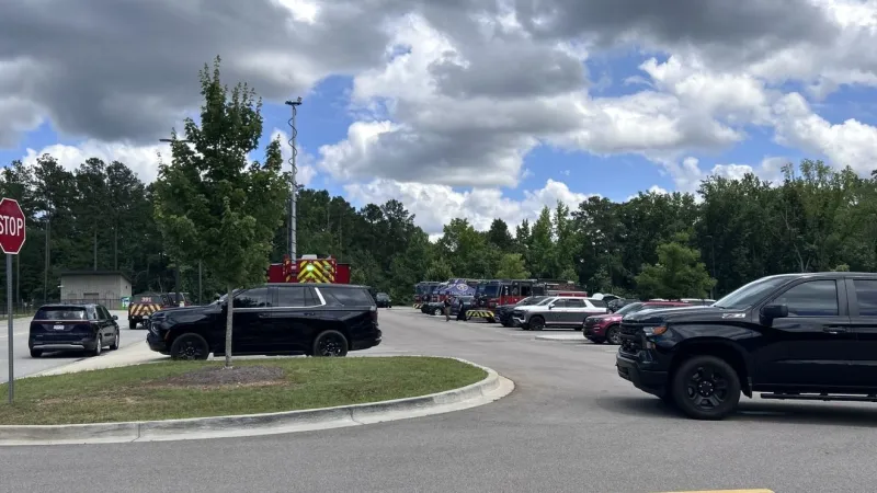 Authorities search near middle school in missing woman case, road closed