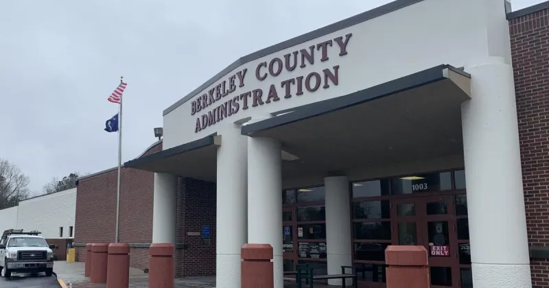 Berkeley County planning commissioner appears to unholster gun during public meeting. He says he didn't.