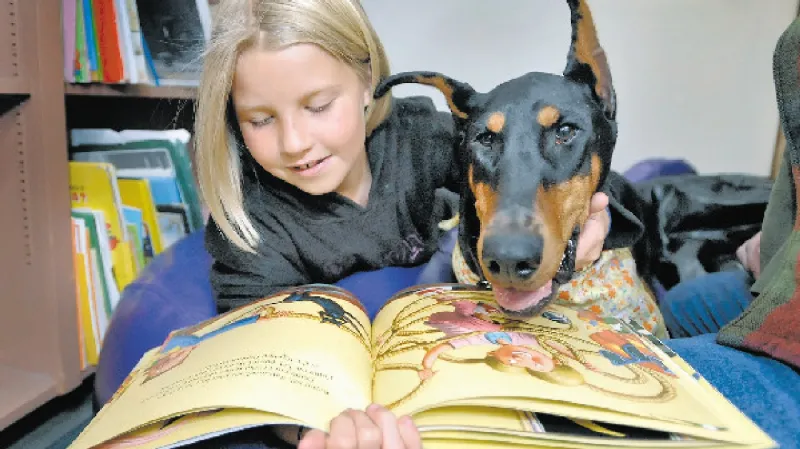 Charleston Animal Society pairs kids with shelter pets for summer reading sessions