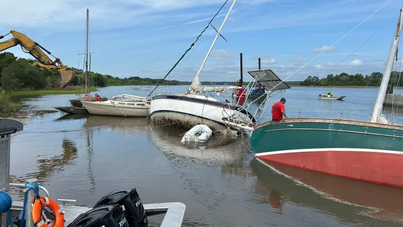 SCDNR and Wounded Nature-Working Veterans remove nine boats at Johns Island landing
