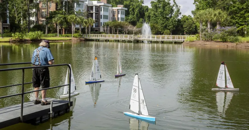 Sailors of all ages race small boats at Bishop Gadsden Yacht Club
