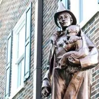 Statue of fireman has watched over city since 1912