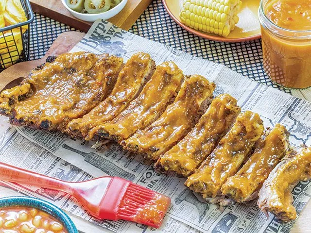 Oven ribs with peach barbecue sauce