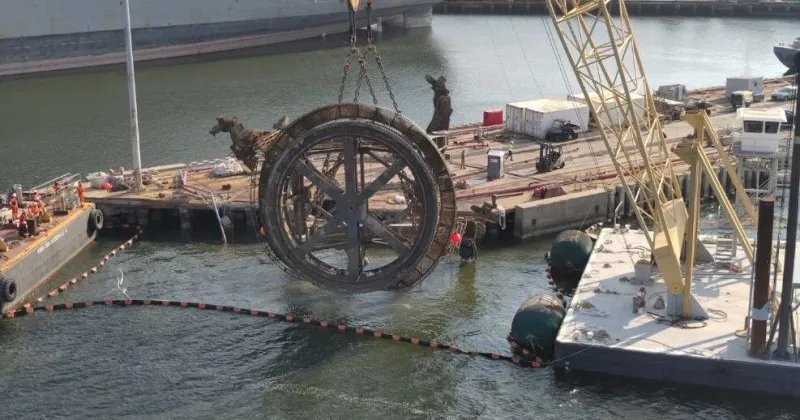 Crane that collapsed off dock at former Navy Base now removed