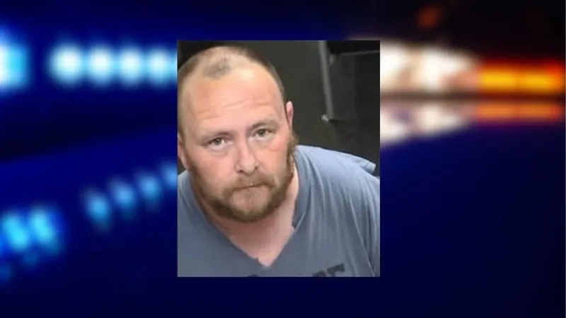Wanted suspect arrested after standoff in Nichols area