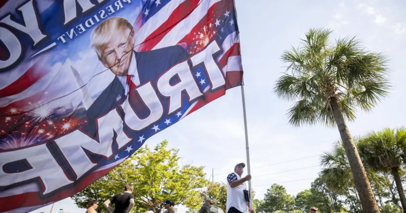 Large crowds line up, battle heat for Trump's rally for Darline Graham in Myrtle Beach