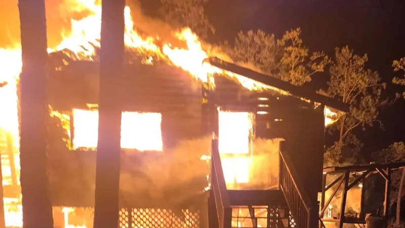 No injuries reported as flames consume log cabin-style house in Meggett