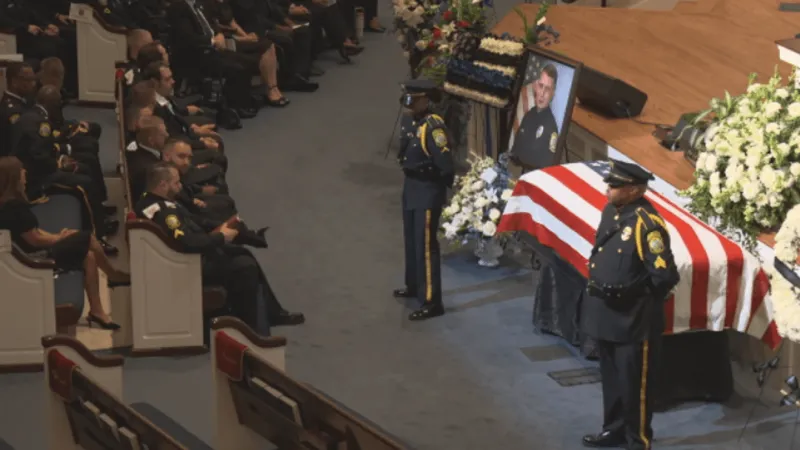 Hundreds honor officer Christopher DeLong at funeral service