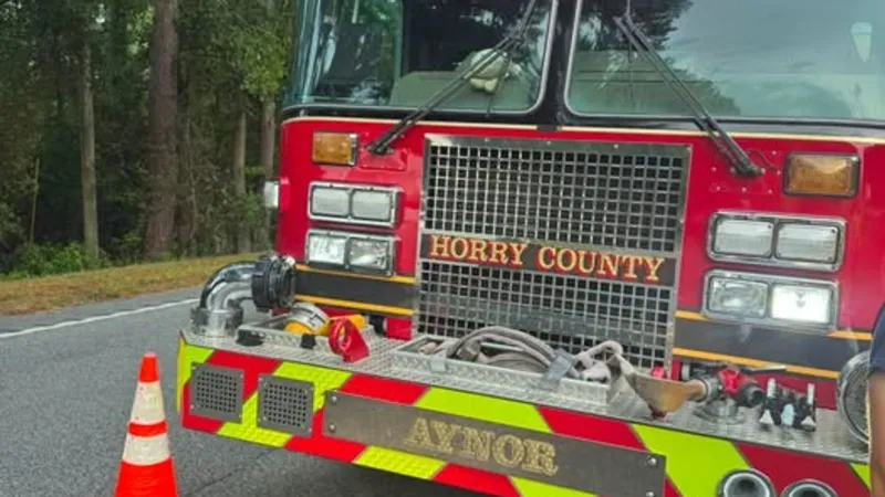 Vehicle fire blocks traffic on Highway 22