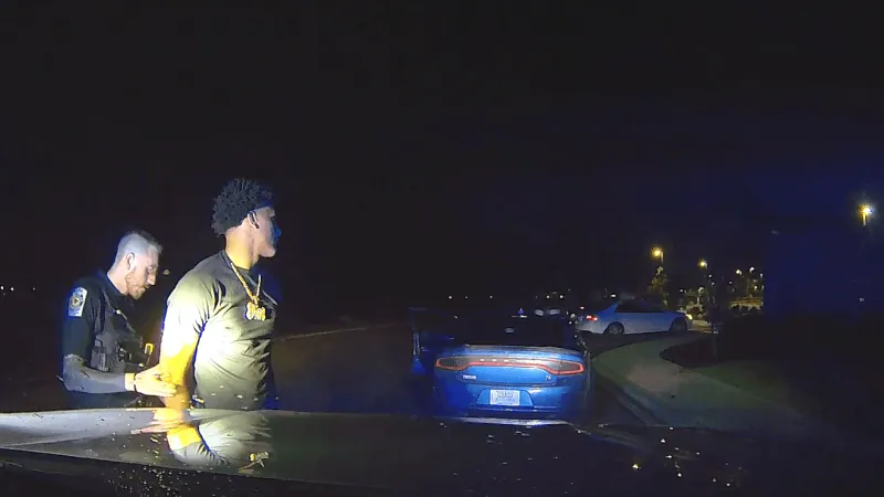 Dashcam video shows alleged street race that led to USC football player's arrest