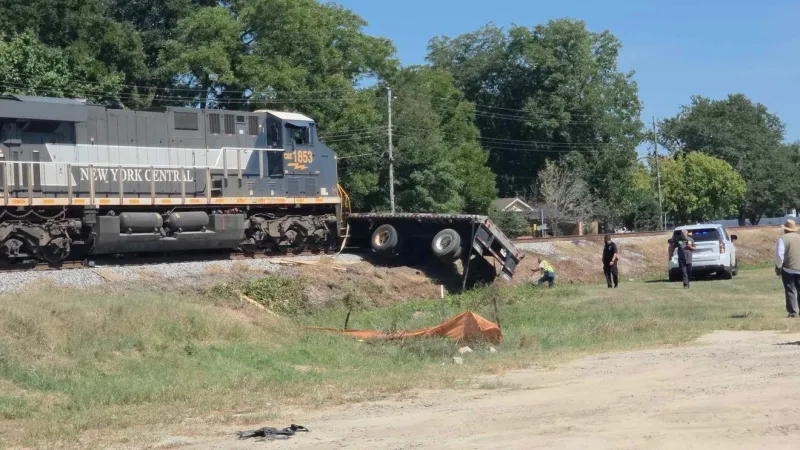 Train, 18 wheeler collide in Pembroke, railroad blocked