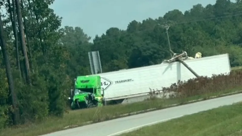 Truck lands into pond, damages power pole along Hwy 501 in Marion