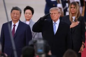 China's Xi arrives in Washington, kicking off his state visit with rare planeside welcome from Trump
