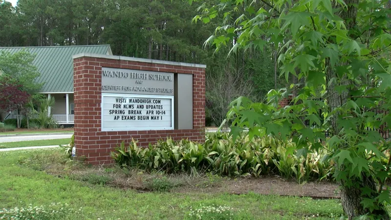 12-gauge shotgun, alcohol and drugs found in student vehicle at Wando High School