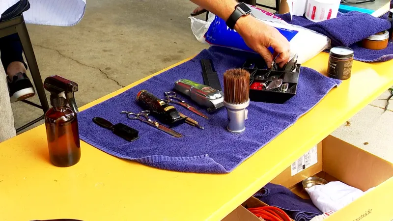Barbering students offer free haircuts to the unhoused