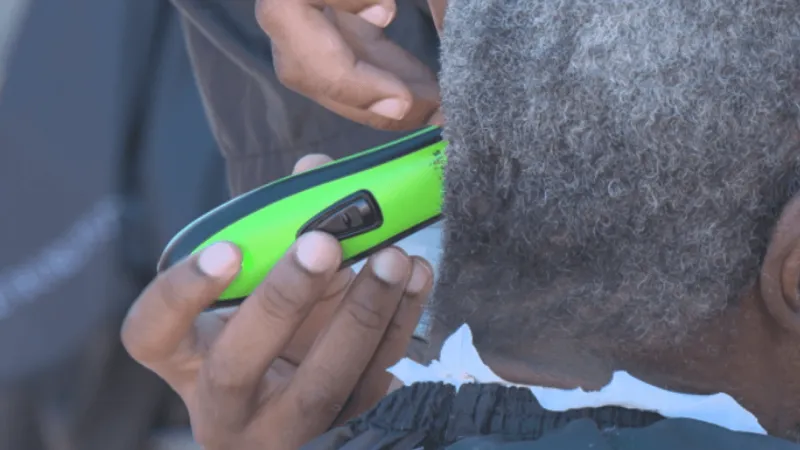 Barbering students give free haircuts to people experiencing homelessness