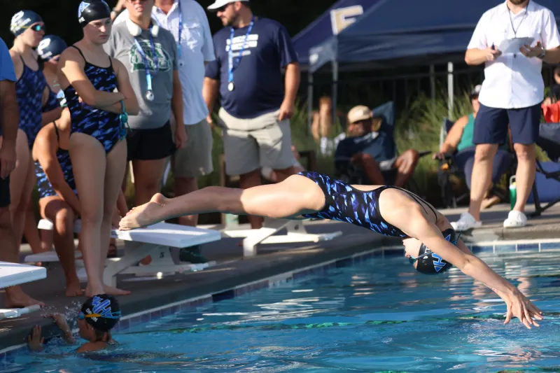 Wilson Hall swim dominates final home meet of season