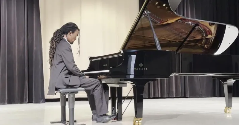 Claflin adds 'magnificent concert grand piano'