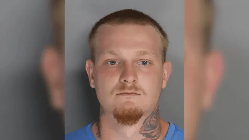 Man charged after Aiken public safety officer shot at in church parking lot