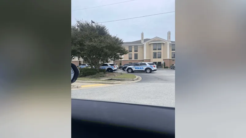 2 arrested after drugs, gun found during hotel fraud investigation