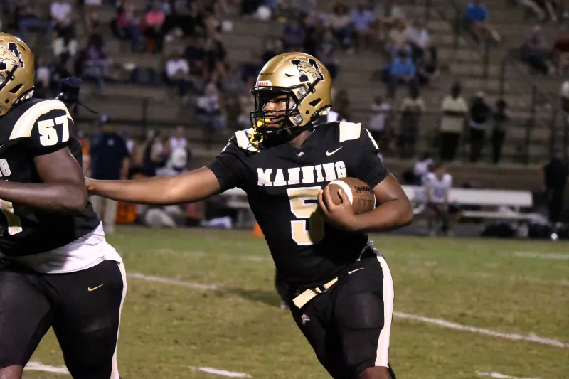 Manning holds off Lake City for 34-28 region victory