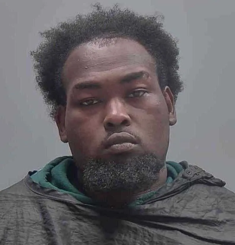 Man arrested in connection with a Thursday evening homicide