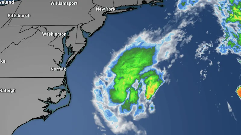Tropical low in the Gulf Stream continues moving away