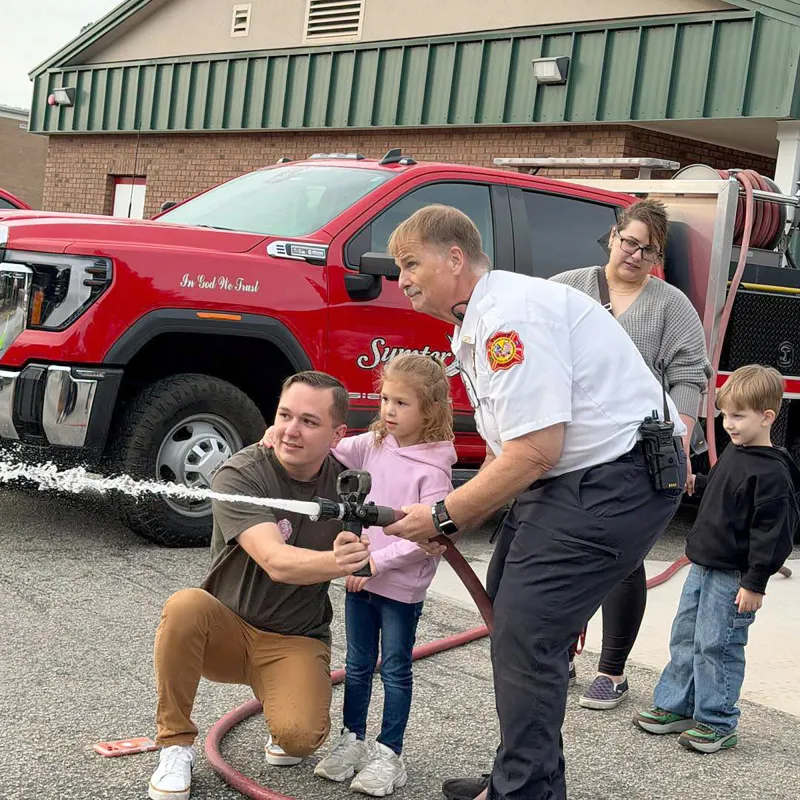 Elementary students visit Sumter firefighters