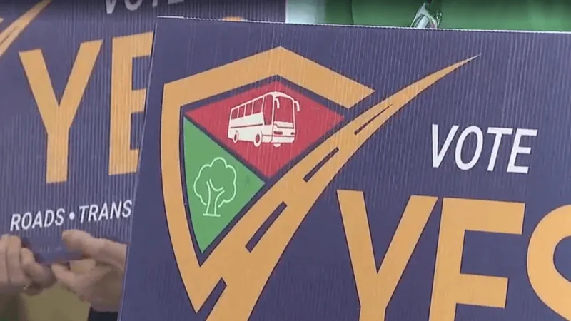 Supporters rally at Rivers Ave railroad crossing for Charleston transportation sales tax