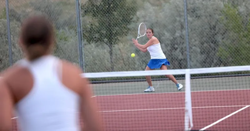 Evie Reinicke, Elliya Strand form a solid doubles pair for St. Thomas More girls tennis