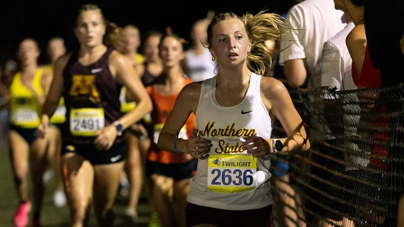 OLESIAK AND HASART PACE WOLVES AT JIMMIE INVITE