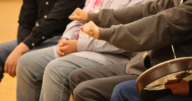 'It's a game of making relationships': Youth hand game tournament a staple for the Black Hills Powwow