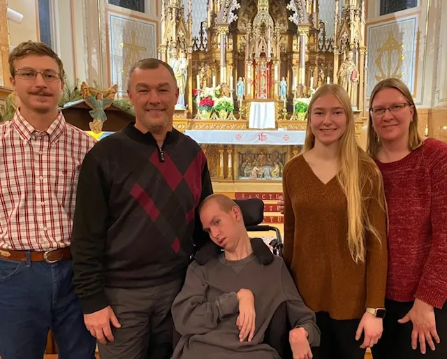Caring for disabled son helps family grow in love and compassion