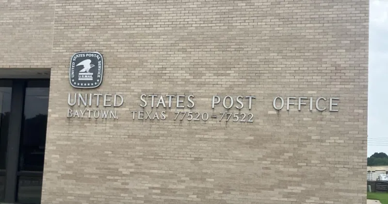 Postal supervisor charged in theft