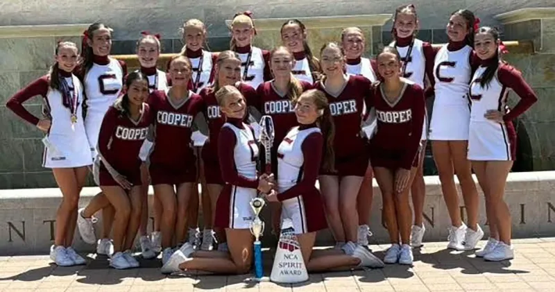 Cooper's Cheer Express: CHS Varsity cheer racks up awards and honors attending camp at SMU