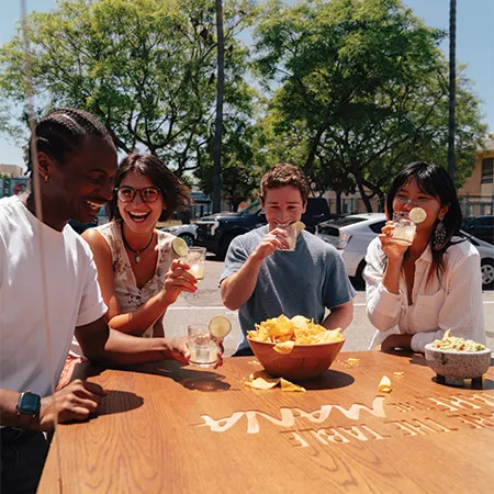 The power of sharing a table: Americans reviving 'IRL' experiences with drinks, dinner and beyond